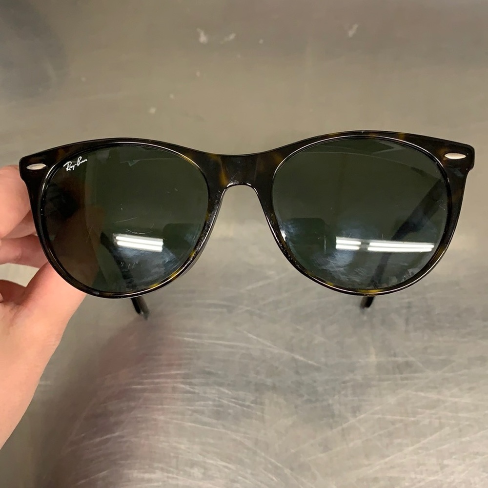 Ray ban glasses.